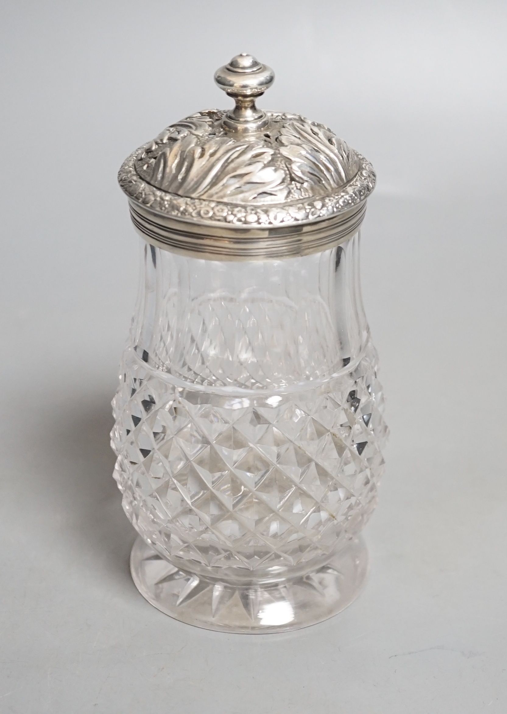 A late George III silver mounted cut glass caster, Edward Farrell, London, 1818, height 16.2cm (split).